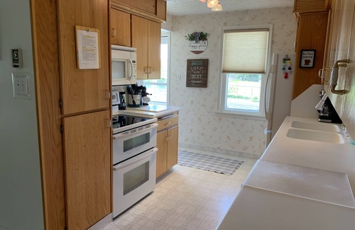 Price House | Experience Helper Charm - Spacious 4-bedroom Retreat