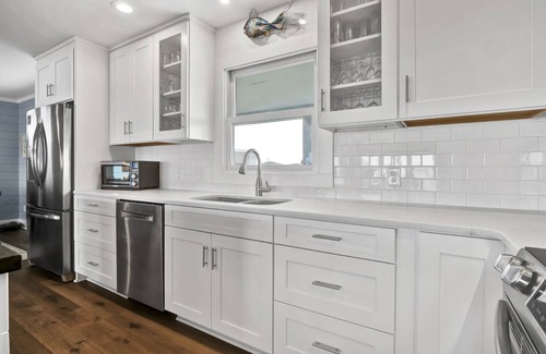 Shell Island House | Experience island life with amazing views and easy beach access! 6BR, 5BA