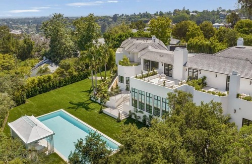 Brentwood House | Experience luxury living in this private city-to-ocean view estate nestled in Mandeville Canyon