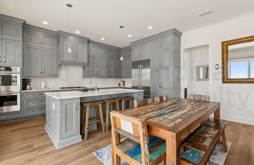 Ocean Cay House | Experience oceanfront luxury at 1088 S. Fletcher Ave, a spacious 5-bedroom house