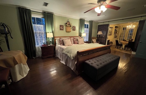 Montgomery Bed & Breakfast | Experience the historic Suite Louise with a parlor and claw tub.