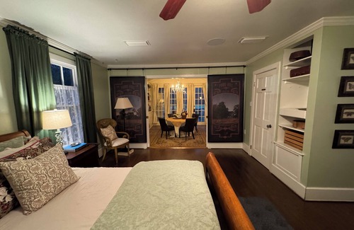 Montgomery Bed & Breakfast | Experience the historic Suite Louise with a parlor and claw tub.