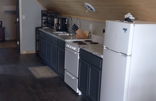 Nekoosa Cottage | "Experience Tranquility: The Loft on Camelot Lake - Your Serene VRBO Retreat"