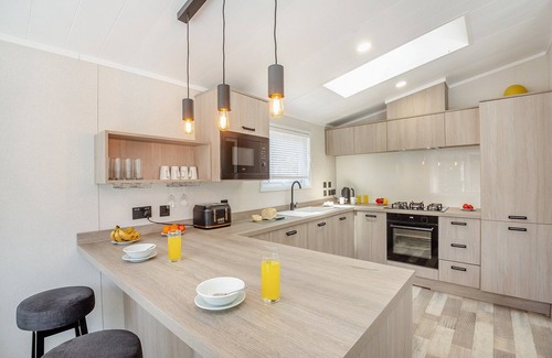 Bethesda Ski Chalet | Experience ultimate luxury with the brand-new Faraday lodge with hot tub.