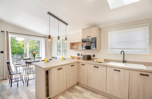 Bethesda Ski Chalet | Experience ultimate luxury with the brand-new Faraday lodge with hot tub.
