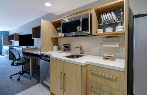 University House | Experience Waco: Suite w/Kitchen & Outdoor Spaces