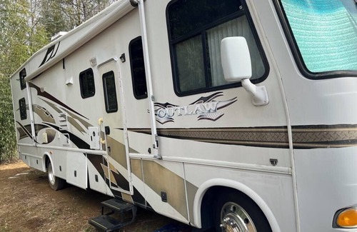 Acworth House | Explore the great outdoors with this Class A Toy Hauler