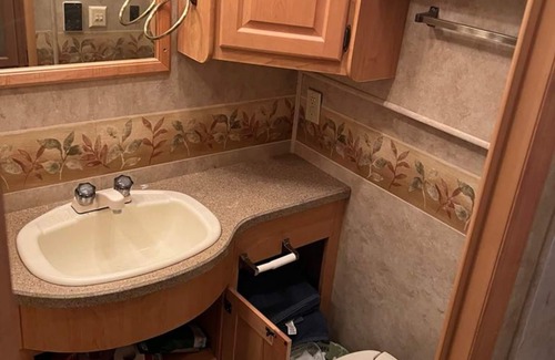 Acworth House | Explore the great outdoors with this Class A Toy Hauler