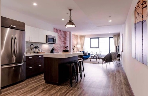 Historic Core Apartment | Exposed Brick Loft-Style Space | Private Balcony!