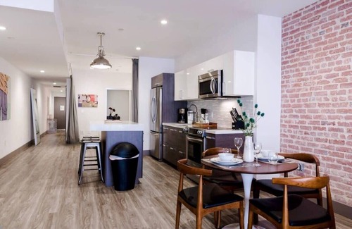 Historic Core Apartment | Exposed Brick Loft-Style Space | Private Balcony!