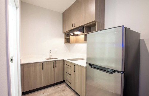 Woodlake - Briar Meadow Hotel | Express INN & Suites