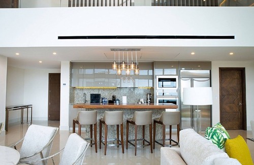 Playa Mujeres Condo | Exquisite 4-Bedroom Loft at Garza Blanca: Your Luxurious Cancun Escape Awaits!