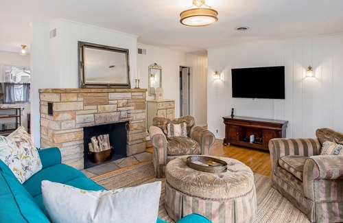 Grand Beach House | Exquisite home with beach access, tennis, firepit, golf, & W/D