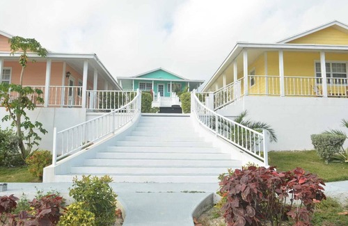 Rolleville Villa | Exuma Point - Swimming Pigs Resort Bougainvillea (Pink) Sunset Villa 1
