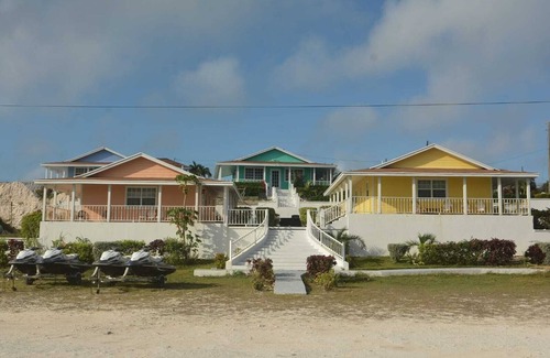Rolleville Villa | Exuma Point - Swimming Pigs Resort Bougainvillea (Pink) Sunset Villa 1