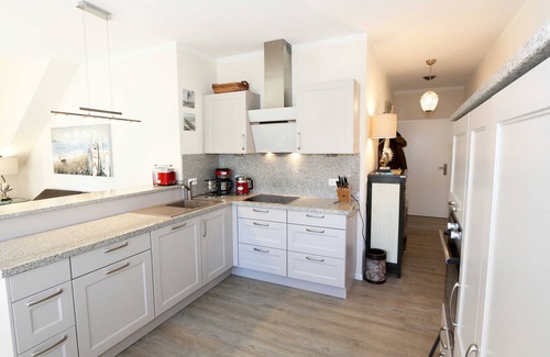 Thiessow Apartment | F: House Sterntaucher Whg 05 with fireplace & balcony - Haus Sterntaucher Whg 05 mit