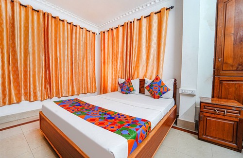 University of Kerala Senate House Campus Hotel | Fabexpress Majestic Inn