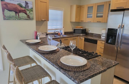 Charlestown Condo | Fabulous 3 Bedroom Spacious Condo at Nelson Springs. Feet from Beach and Pool.