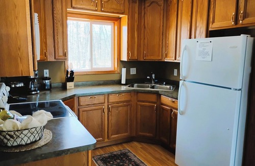 Spooner Cabin | Fabulous fall cabin on Mystery Lake! Cruise on the Pontoon, Kayak & Fish!