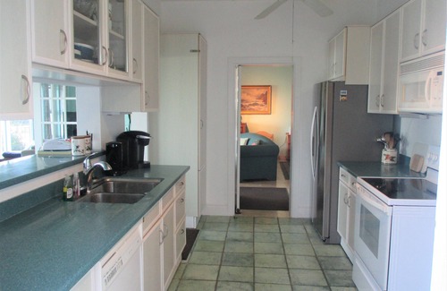 Sandys Apartment | Fabulous ocean view, private pool and garden, ideal location.