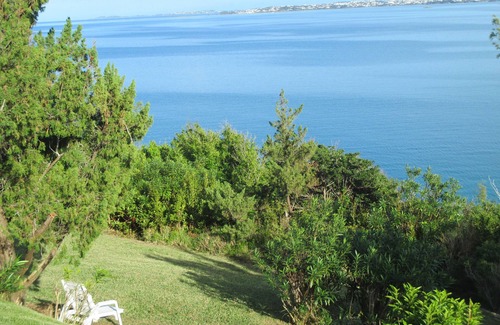 Sandys Apartment | Fabulous ocean view, private pool and garden, ideal location.