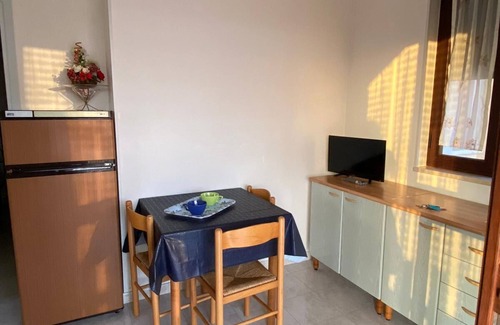Torre Suda House | Fabulous one bedroom apartment just steps from the crystal clear sea in a residential area