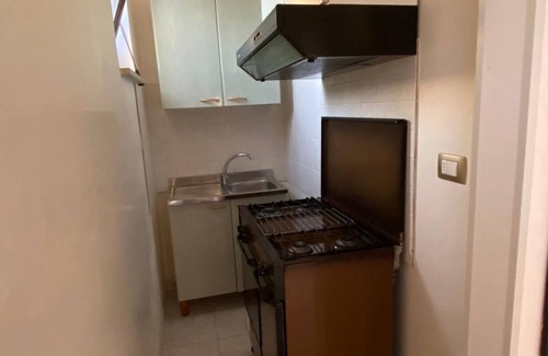 Torre Suda House | Fabulous one bedroom apartment just steps from the crystal clear sea in a residential area