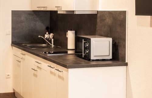 Nordhorn Apartment | FAIR BED 9 City Studio with kitchen, WLAN, 2 rooms & PP
