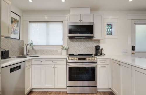 Fairfield House | Fairfield Estate Coach House, close to Cook Street Village by Victoria Prime!