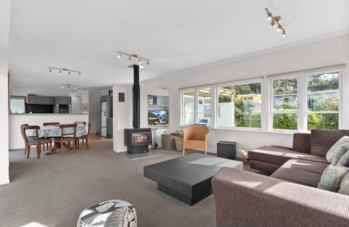Mangawhai Heads House | Fairport House - Sunny holiday home with large decks, lovely views and a short stroll to the estuary