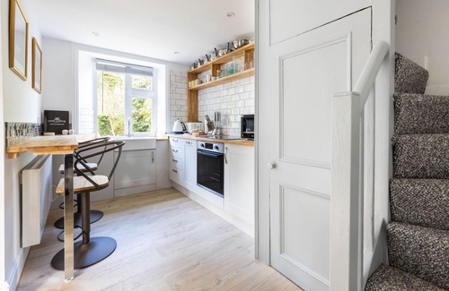 Illogan Cottage | Fairytale Thatched 18th Century Cornish Cottage with Hot Tub & Stunning Gardens