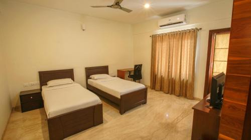 Yelahanka Bed & Breakfast | Falcon Suites Yelahanka New Town