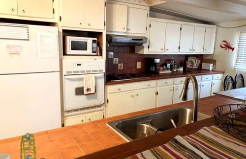New Roads Cottage | False River fishing camp PARTY BARGES AVAILABLE ON REQUEST