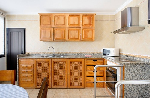 Urbanizacion Famara Apartment | Famara Beach Apartment on the Shore with Shared Pool, Terrace, Ocean/Mountain Views & Wi-Fi