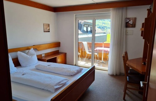 Unterburg am Klopeiner See Bed & Breakfast | Familienzimmer, Dusche, WC, Balkon - Pension Tulpe