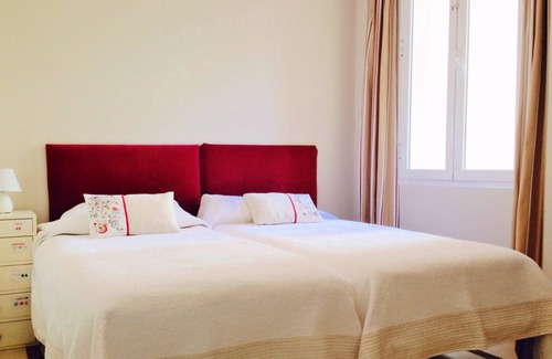 Campos Eliseos Condo | Family apartment next to the center and beach with sunny terrace, parking, wifi.