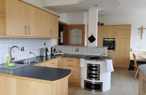 Kurtatsch an der Weinstraße House | Family apartment with playground and terrace surrounded by vineyards
