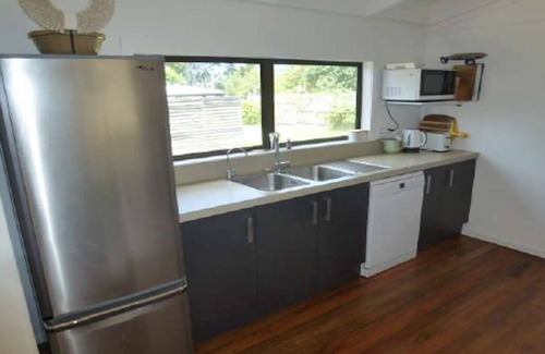 Whangamata House | Family Beach house with Private Jetty and Spa Pool