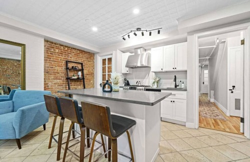 Central Park North House | Family Brownstone with Private Backyard Near Subway