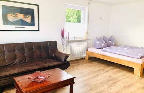 Lauchringen Apartment | Family/comfort room with shared bathroom