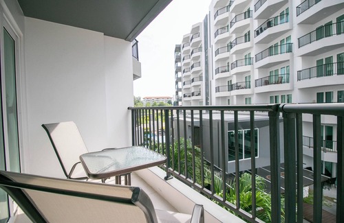 Kram Condo | Family for 4 people, 2 pools, AC, Kitchen, Fitness and near the beach