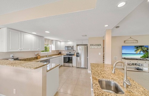 Fort Myers Beach House | Family Friendly Beach Home with Large Heated Pool