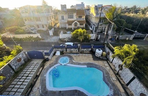 Mont Choisy Apartment | Family-friendly 2-bedroom apartment with pool - 5 minutes walk to the beach