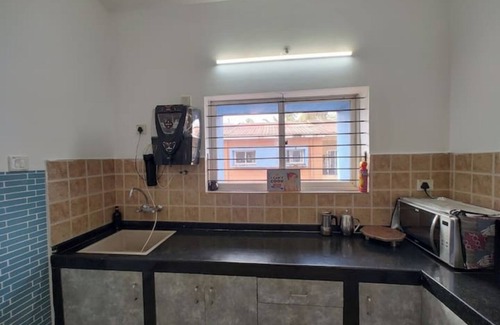 Kudal Apartment | Family Friendly 2 Bedroom Apt in Siolim with Pool, WiFi, and AC. Enjoy your stay