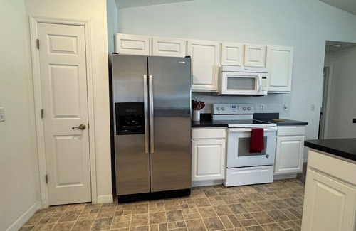Inverness House | Family Friendly 4-bdrm house with heated pool on Lakeside Golf Course