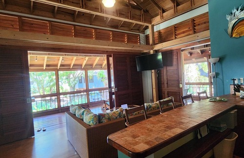 Palmetto Bay House | Family Friendly Beach Bungalow. Private Eco Dive Resort With A Pool & Beach