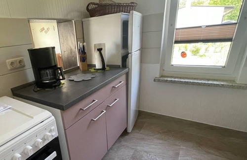 Neukalen House | family-friendly bungalow with fireplace, terrace, barbecue, boat rental