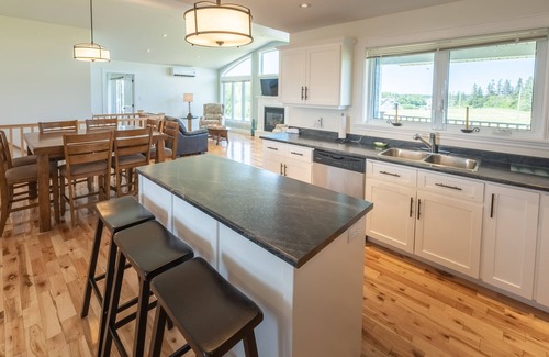 Stanley Bridge House | Family friendly home with private outdoor hot tub & fire pit