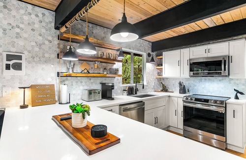 Burley Cabin | Family friendly cabin nestled in the trees and walking distance to beach.