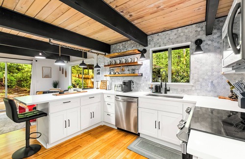 Burley Cabin | Family friendly cabin nestled in the trees and walking distance to beach.